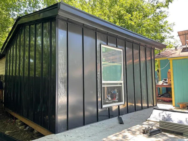 Black standing seam metal wall panels for Roof Inspection in Clarksdale